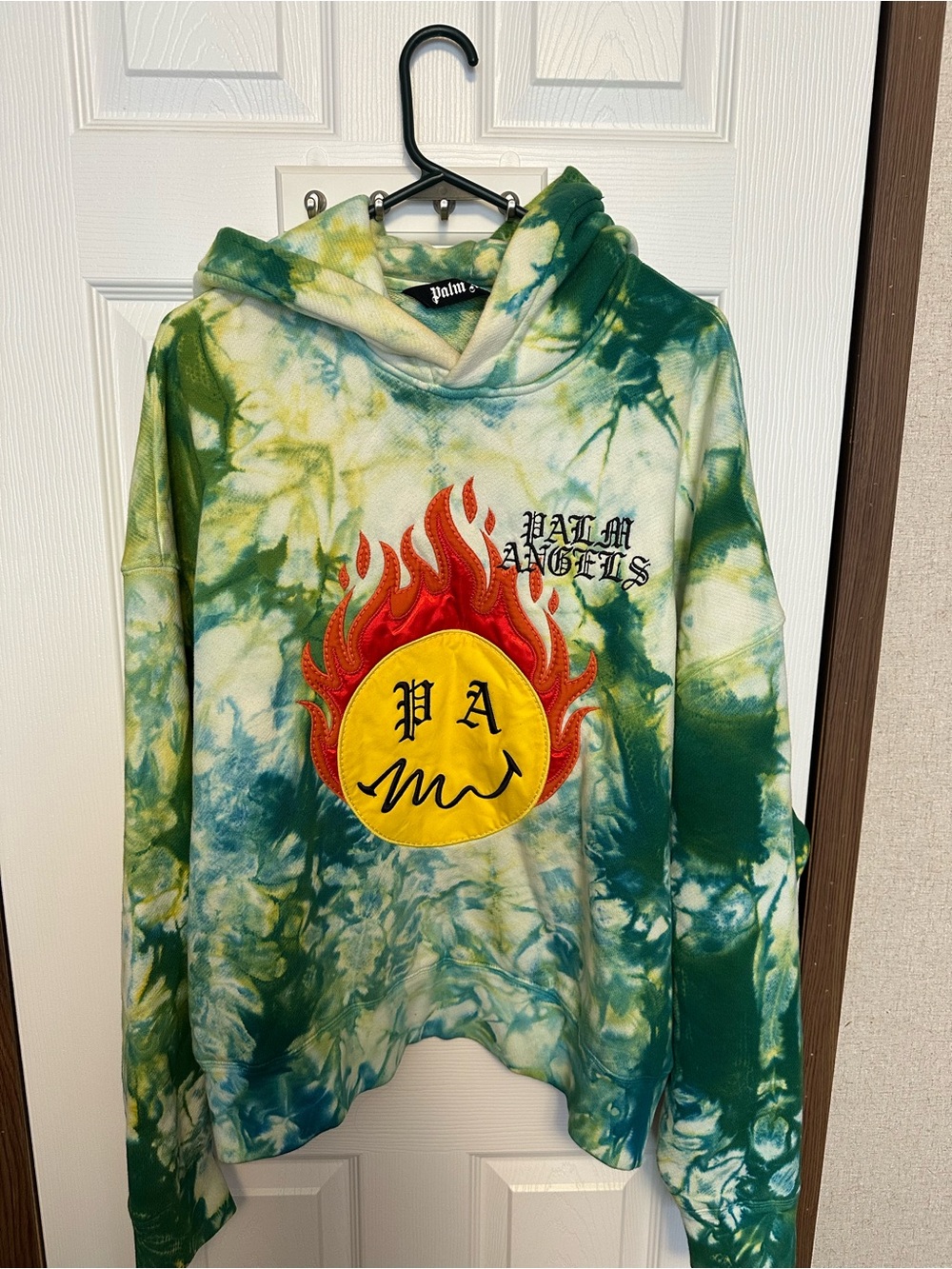 Palm Angels green tie-dye "Burning Head" Smiley intarsia hoodie